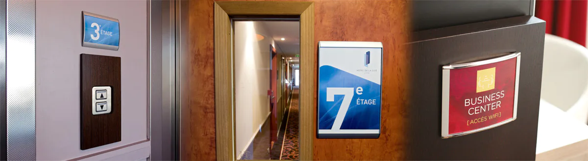 signalétique intérieure : plaques de porte alu et plexi avec visuel interchangeable pour indiquer l'étage d'un hôtel.
